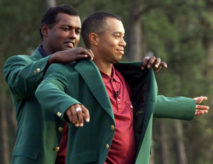 Tiger Woods finishing his "Tiger Slam" in 2001. (Photo by Associated Press)